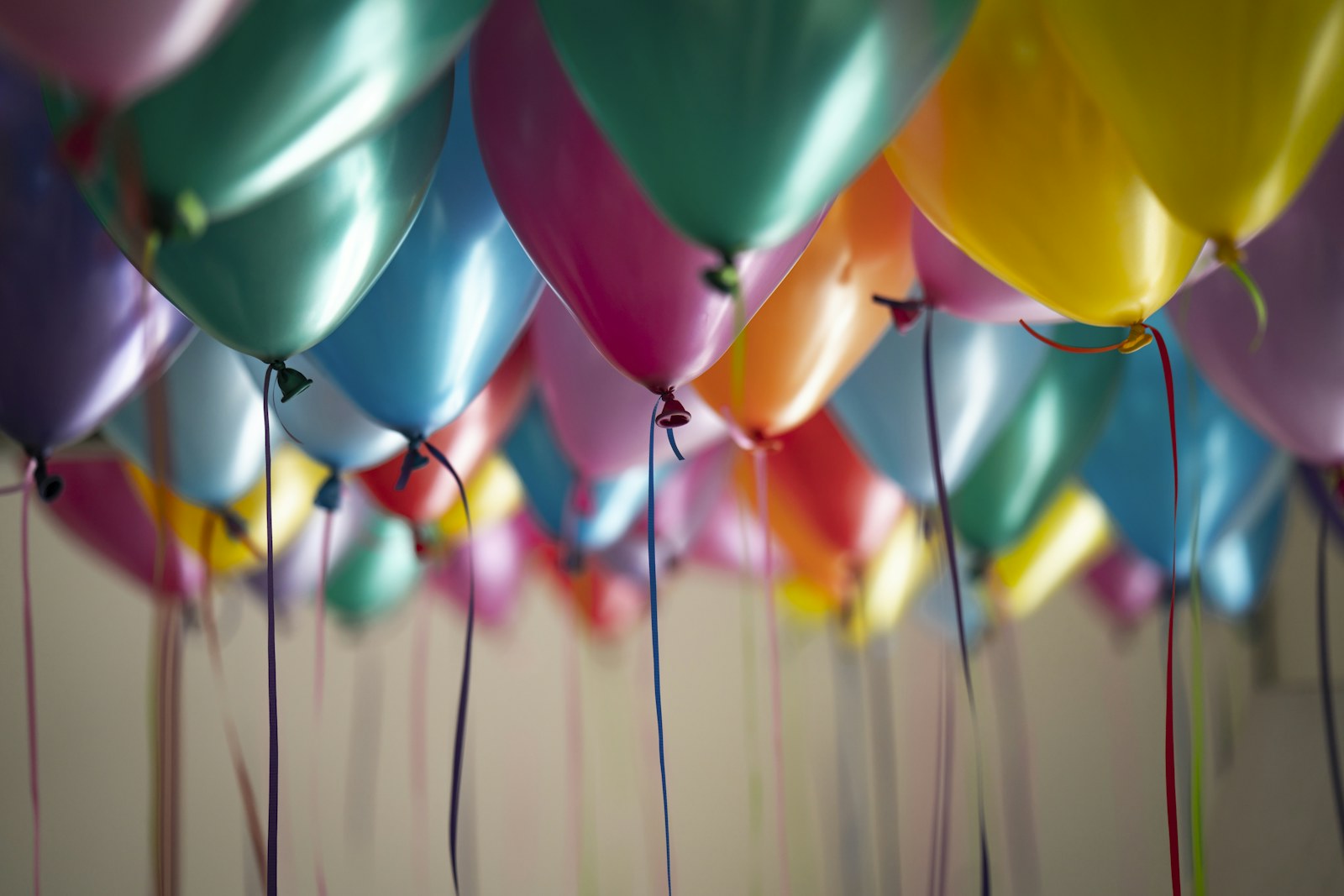 Cluster of colourful balloons styled for a birthday celebration